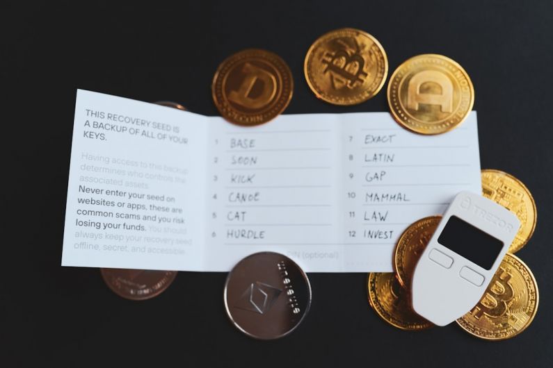 Quantum Cryptography - a cell phone sitting on top of a pile of coins