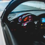 Autonomous Vehicle - black car steering wheel during daytime