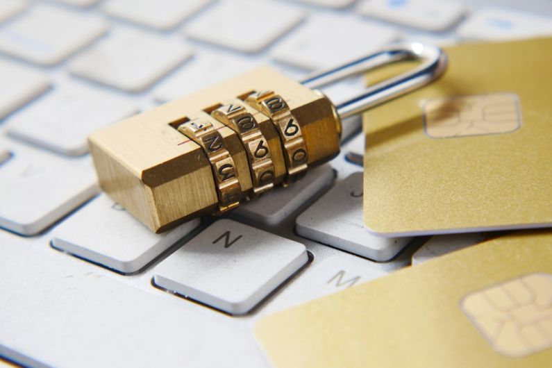 Data Privacy - a golden padlock sitting on top of a keyboard