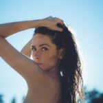 Solar Panel Skin - shallow focus of woman posing