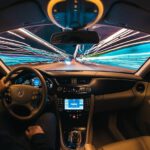 Autonomous Car - time lapse photography of man riding car