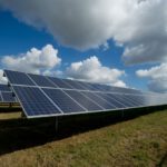 Quantum Dot Panel - solar panels on green field