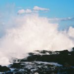 Wave Energy - a large wave crashing into a rocky shore