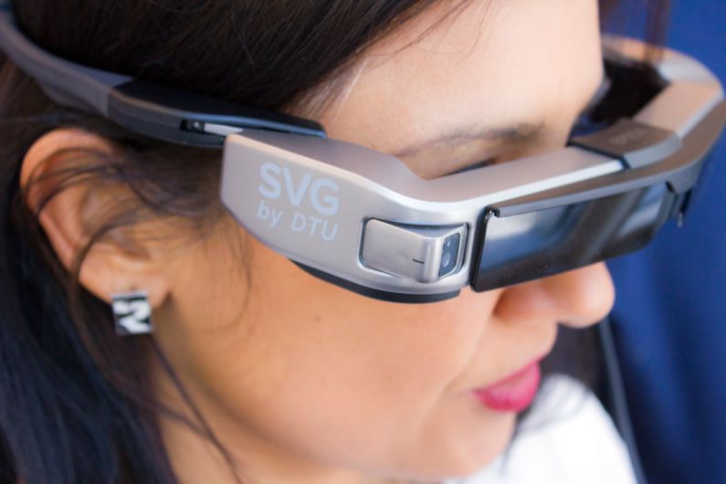 Smart Glasses - woman wearing SVG sunglasses