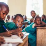 Smart Classroom - children writing in books