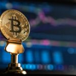 Digital Currency - selective focus photo of Bitcoin near monitor